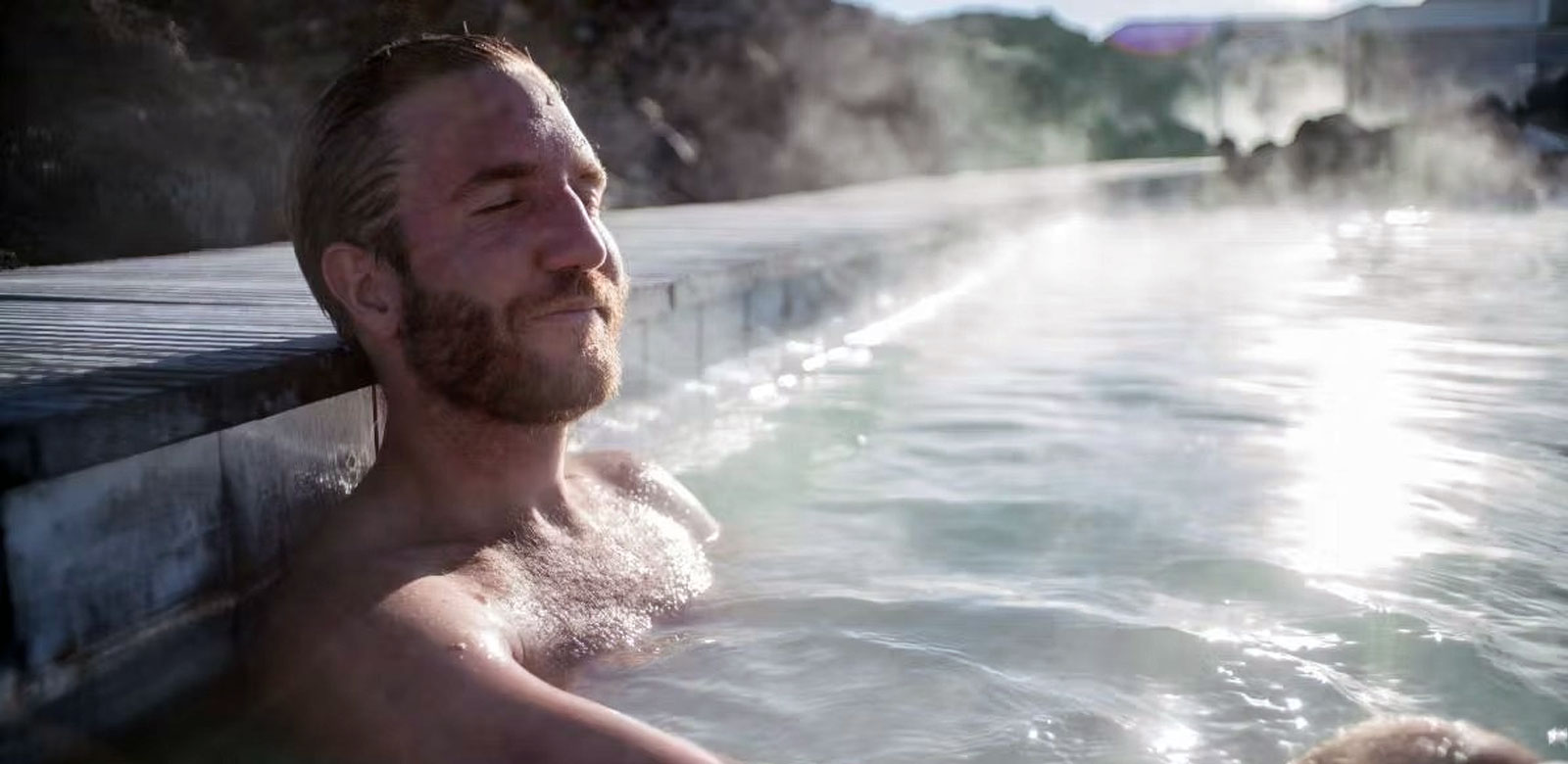 man soaking in the hot springs pools easily accessed from our hotel in Pagosa Springs