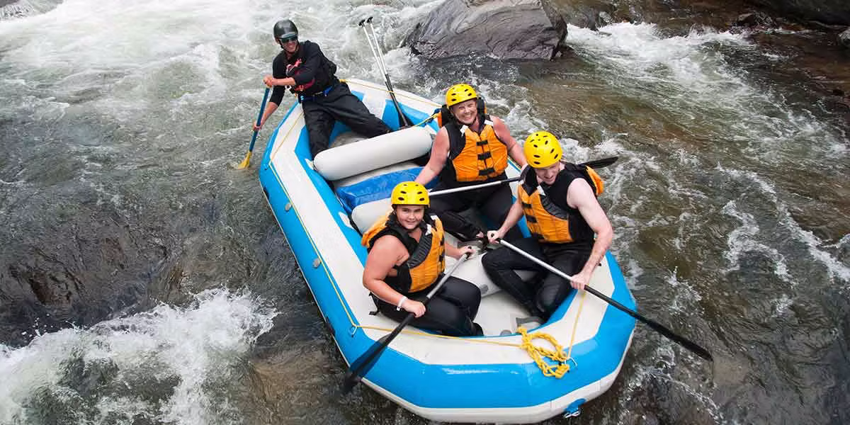 People enjoying whitewater rafting on the San Juan River