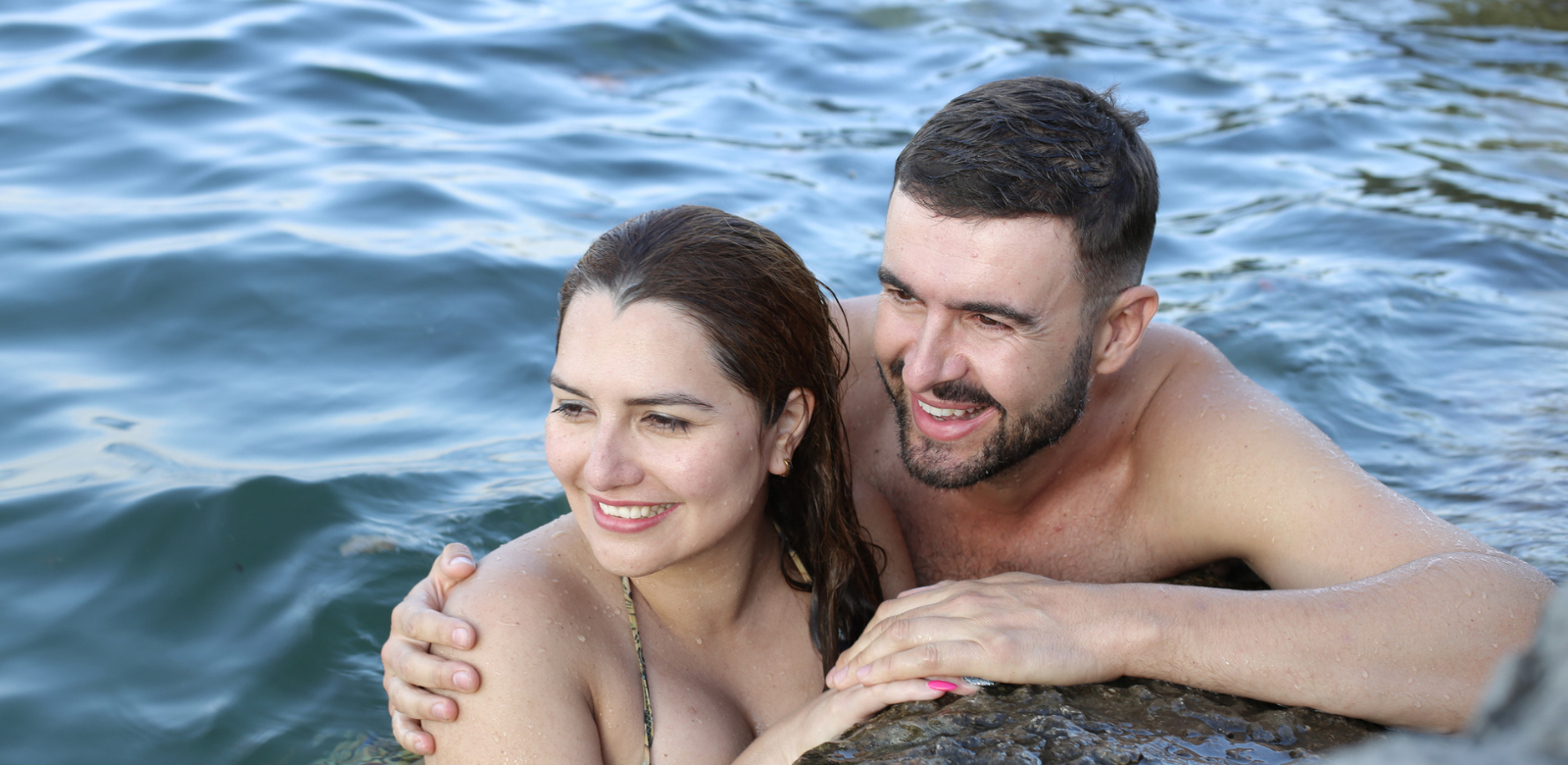 A couple enjoying their time soaking in the Hot Springs