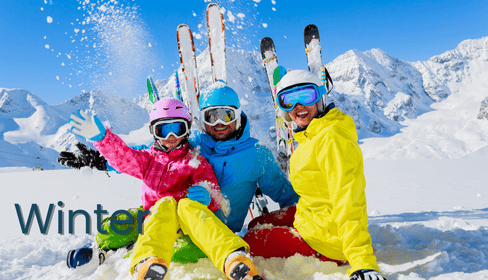 Family in ski clothing at the ski resort in Colorado.