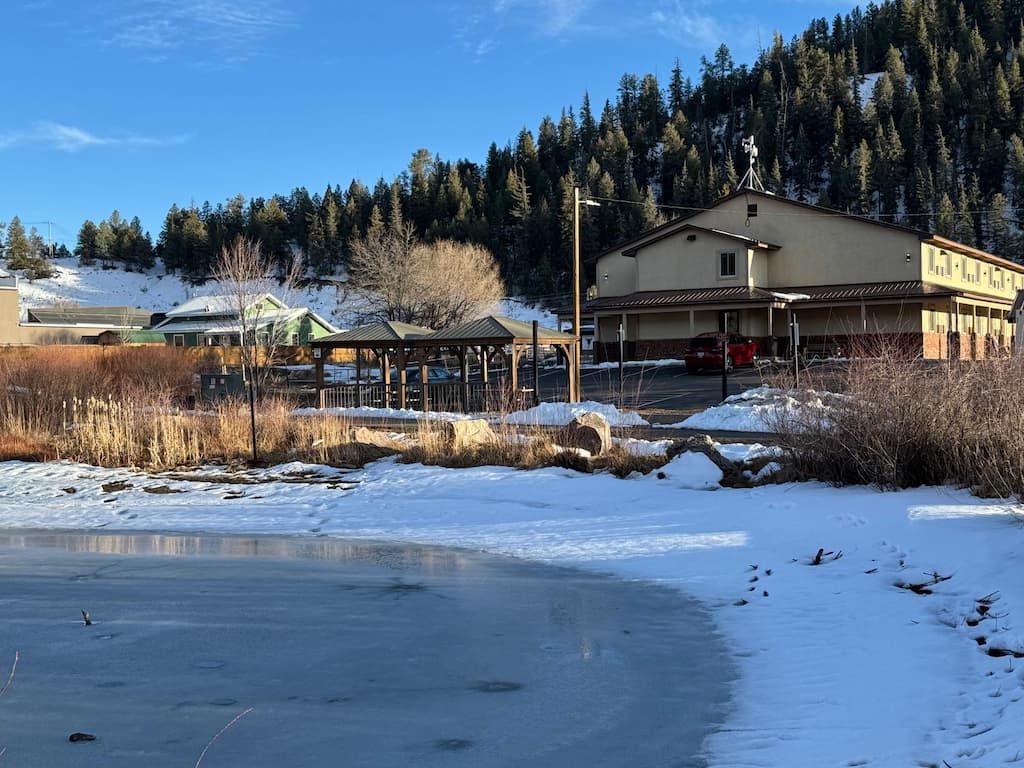 A snow-covered pond behind our Pagosa Springs Hotel