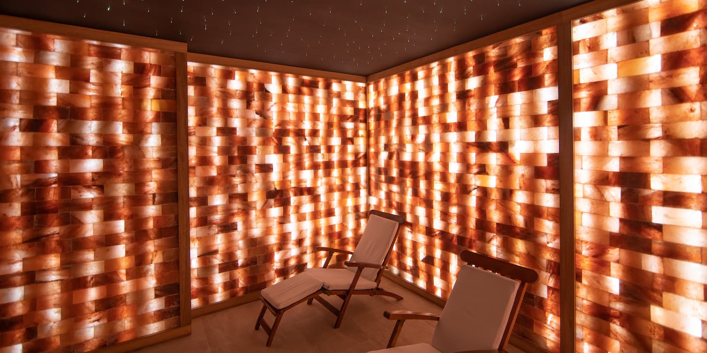 A salt cave room with two lounge chairs at a Pagosa Hot Springs Resort